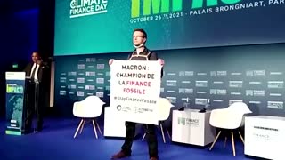 Activists disrupt green finance summit in Paris