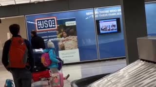 Dad Drags Daughter Through Airport