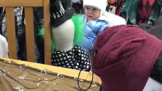 Boy Isn't Scared of Clown Decoration in Halloween Store