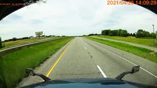 Truck Tips Into Ditch on Interstate