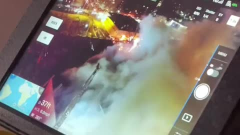 Firefighters use drone to direct guns, multiple injuries as eight-alarm fire burns