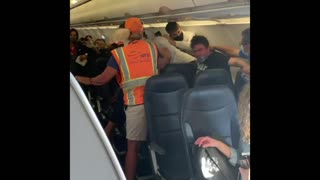 Fight breaks out on plane after passenger refuses to wear face mask under shield