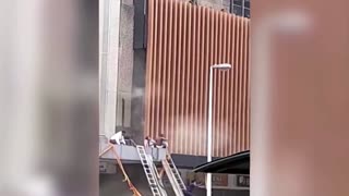 Baby thrown from burning Durban building