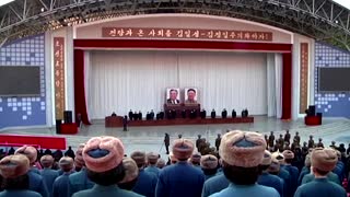 North Koreans rally for new five-year plan