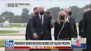 Biden appears to check watch during ceremony for service members killed in Kabul airport attack
