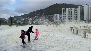 Cape Town Storm Brings Waves of Seafoam onto Shore