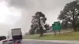 Florida twister caught on camera just to the side of the highway
